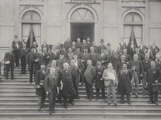 Photograph of the first commission at the Conference, chaired by Mr. Beernaert